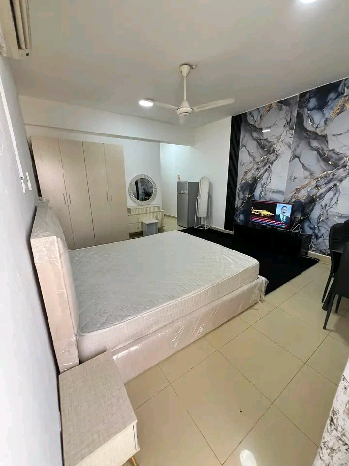 First tenant: room, bathroom, and balcony