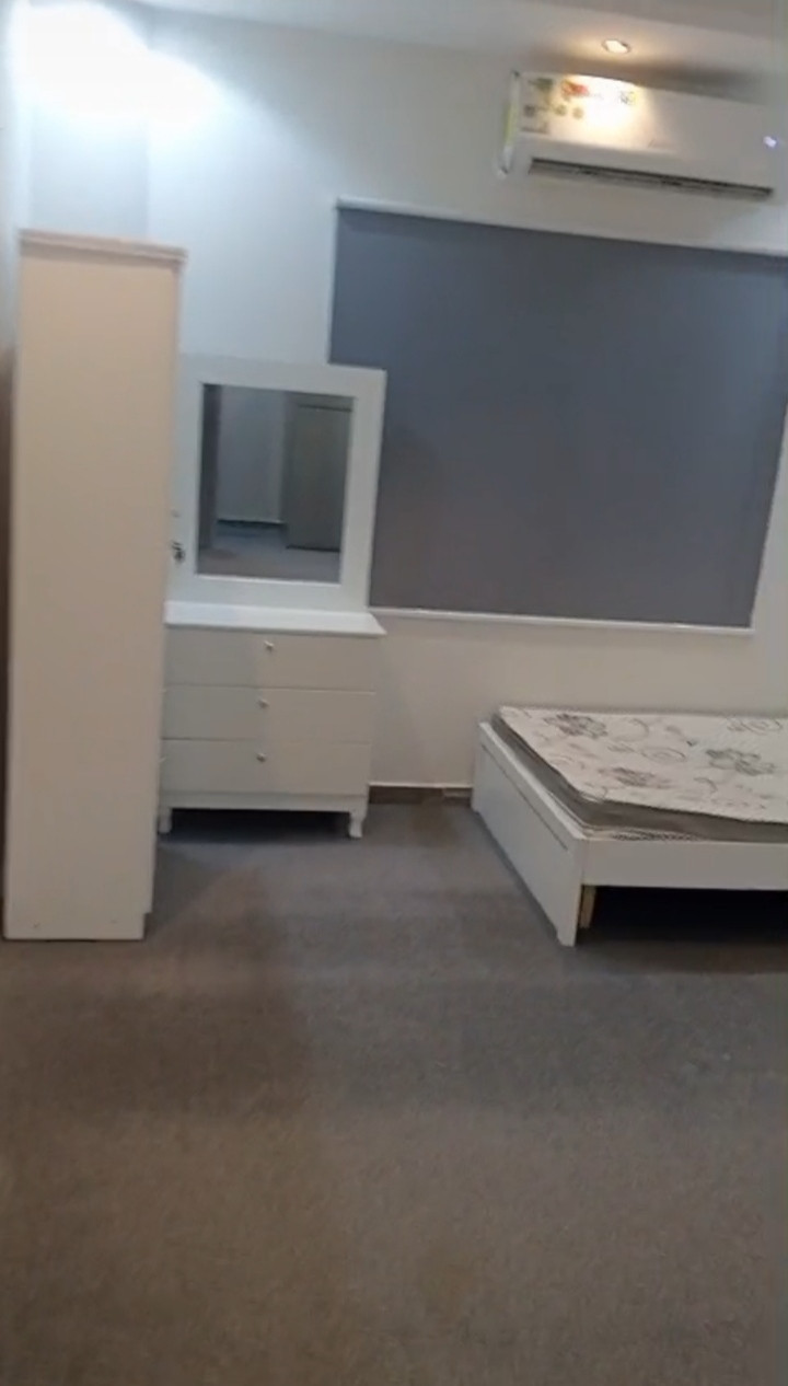 Studio apartment with room, bathroom, and furnished kitchen