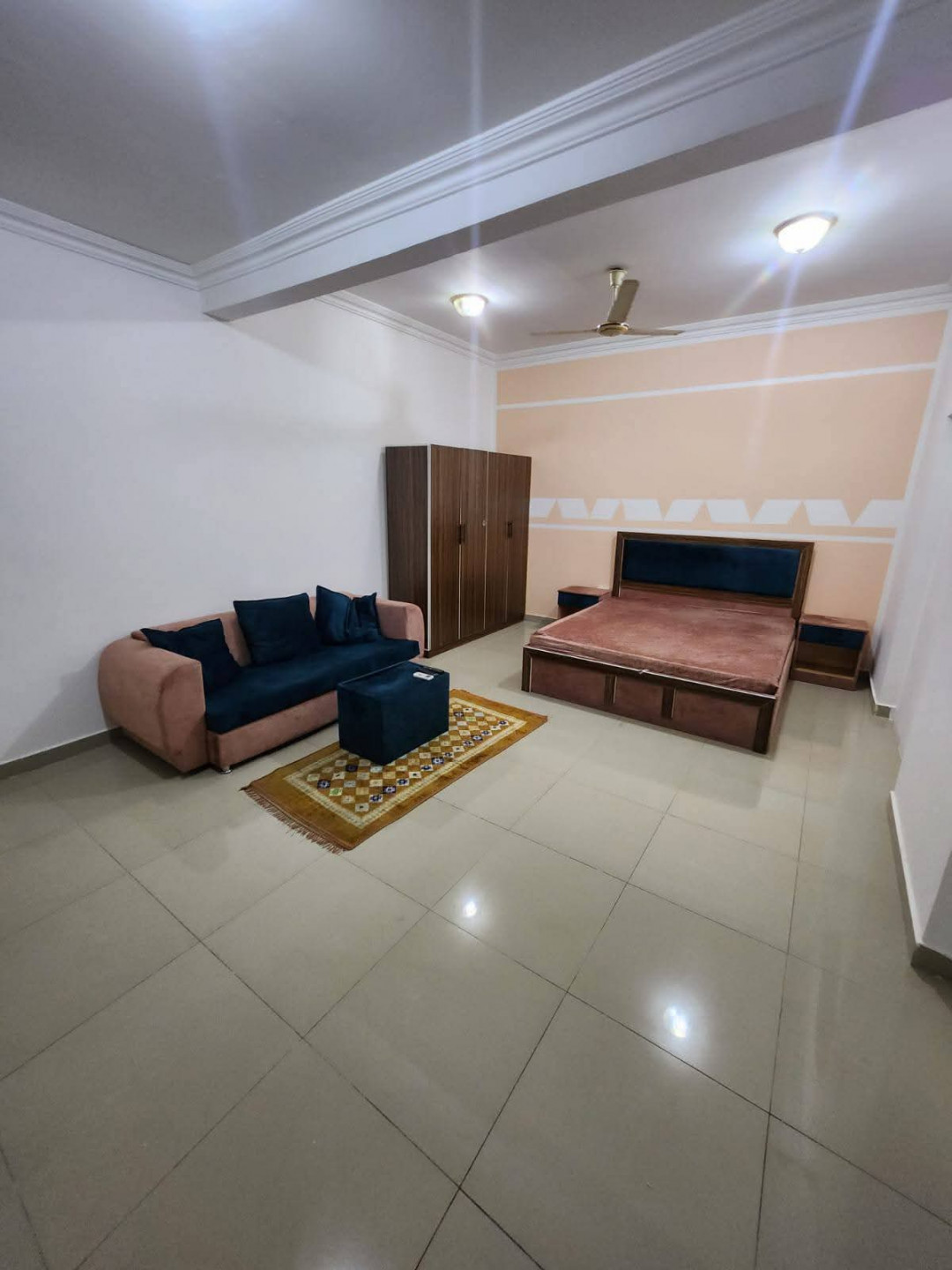 Large studio apartment with one room, bathroom, and kitchen