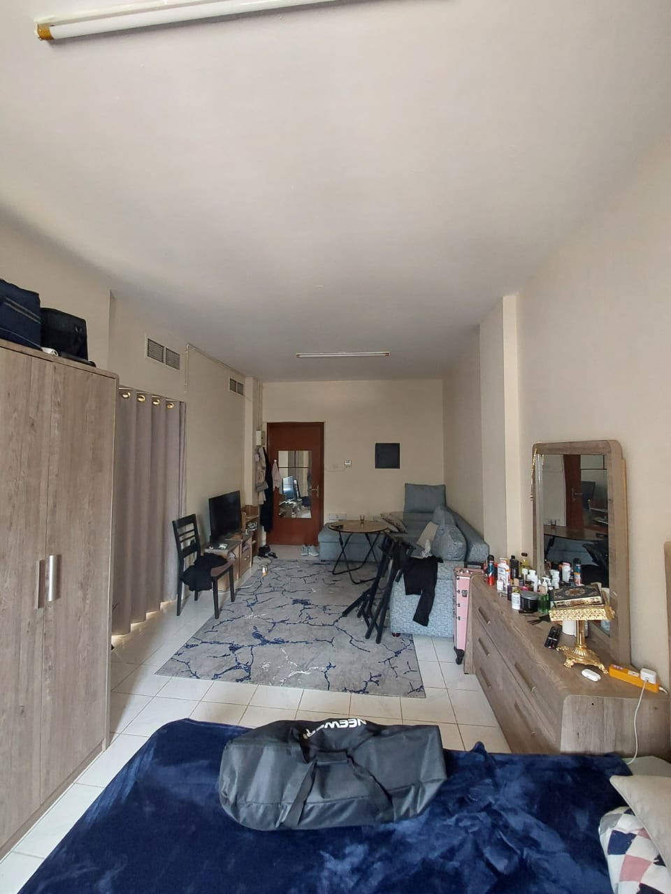 Spacious studio with clean furnishings