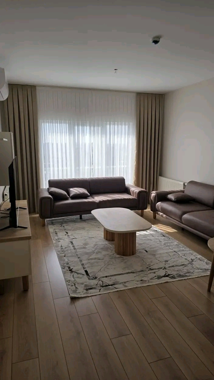 Brand new furniture, first occupancy, furnished two-bedroom apartment with living room.