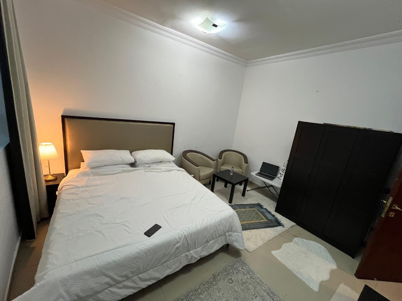 Very clean family room with shared bathroom