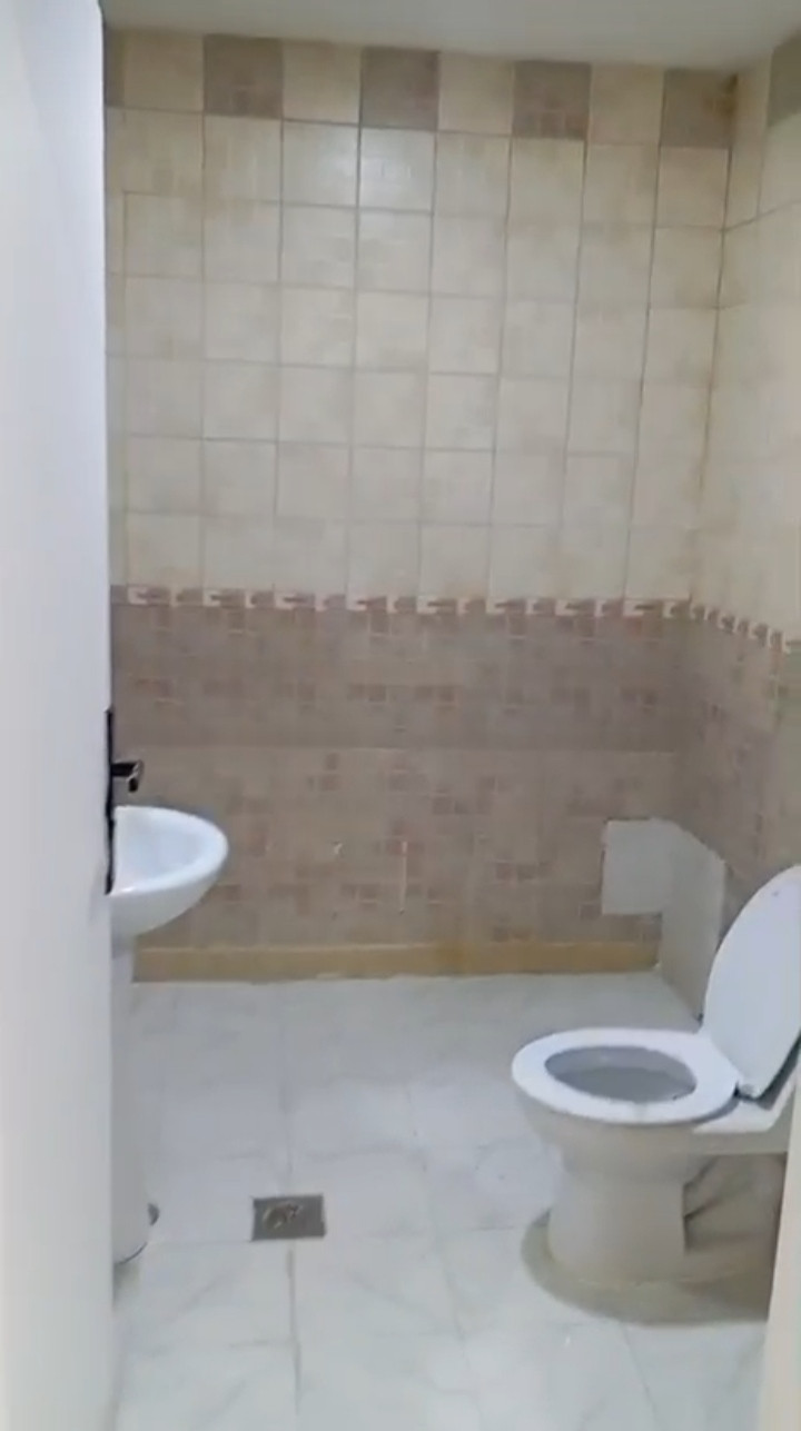 Two bedrooms, a living room, a bathroom, and a separate kitchen.