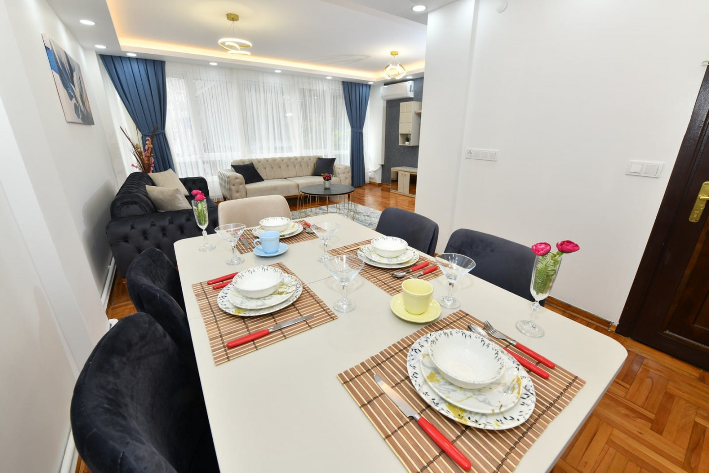 Two rooms and a living room with air conditioning