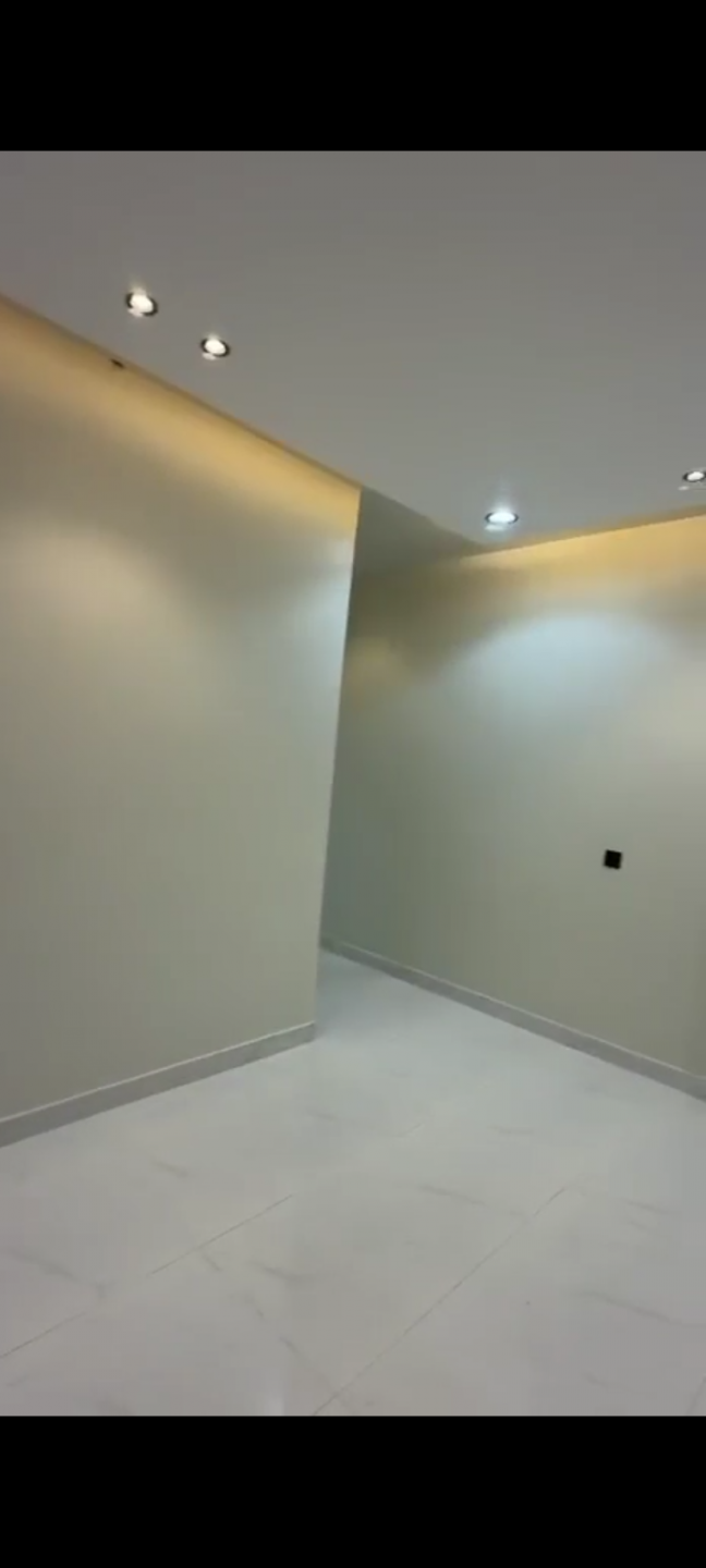Al Salam neighborhood, two rooms, a living room, and a private yard.