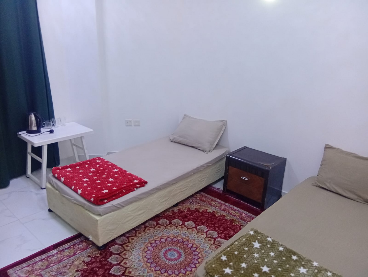 Daily and monthly rentals of shared accommodation for young men on Al Maha Main Street, including all services and bills.