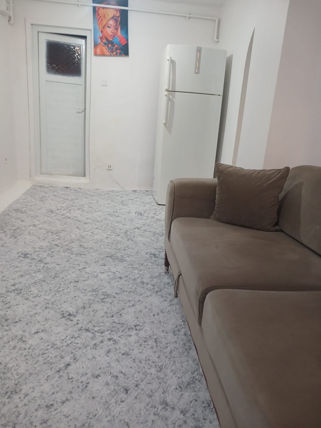 Furnished two-bedroom apartment with a living room, half-basement