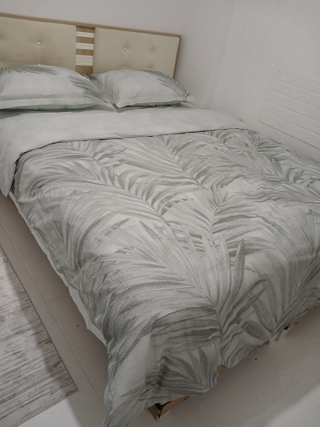 Furnished two-bedroom apartment with a living room, half-basement