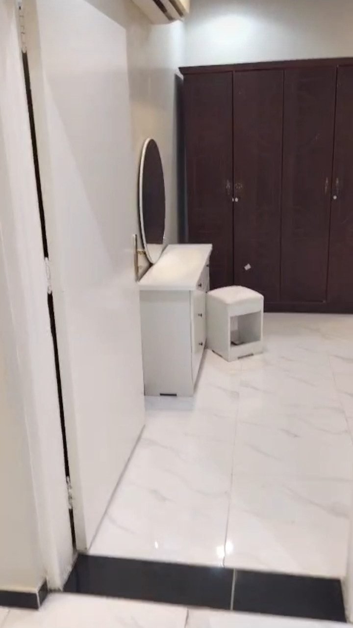 Second floor apartment, two bedrooms and a living room, half furnished